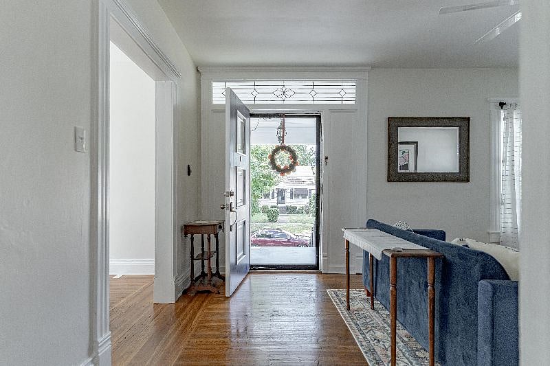 Dining room is through the doorway to the left as you are looking at front door in this photo. Dining room captured in next photo.