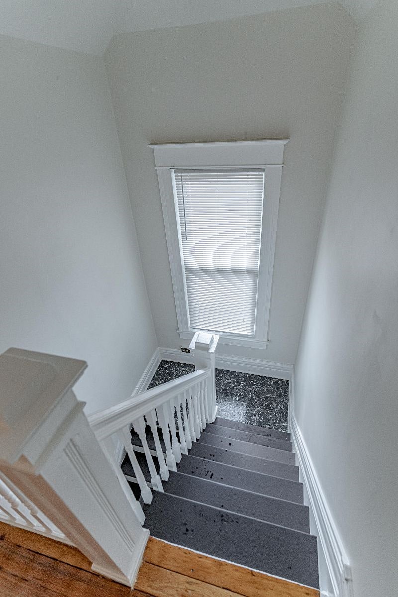 Looking down stairwell from 2nd floor landing.