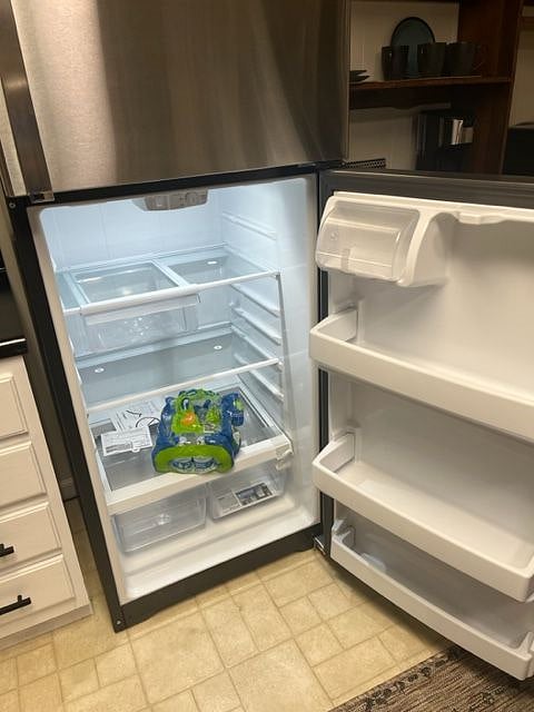 Full-sized, new refrigerator