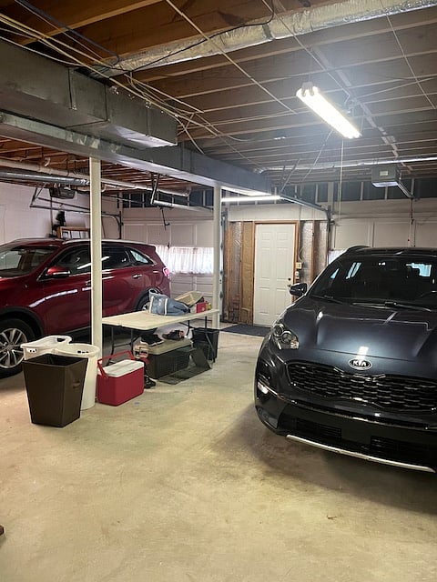 Private parking space in shared garage with remote-controlled opener
