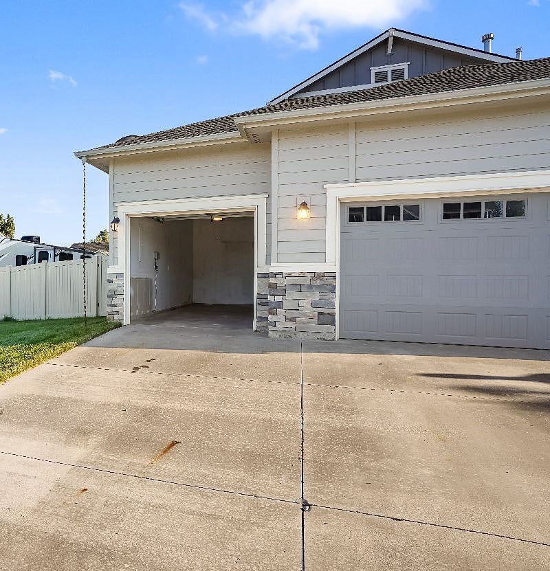 Off street parking space on driveway available if you prefer to use garage for storage.