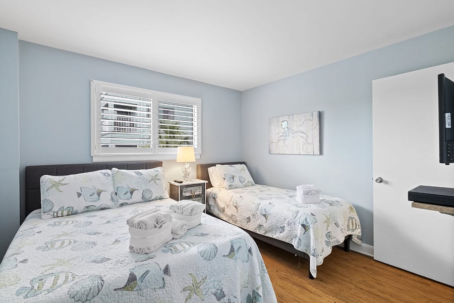 2nd Bedroom with Full and Twin Beds and Privacy Shutters