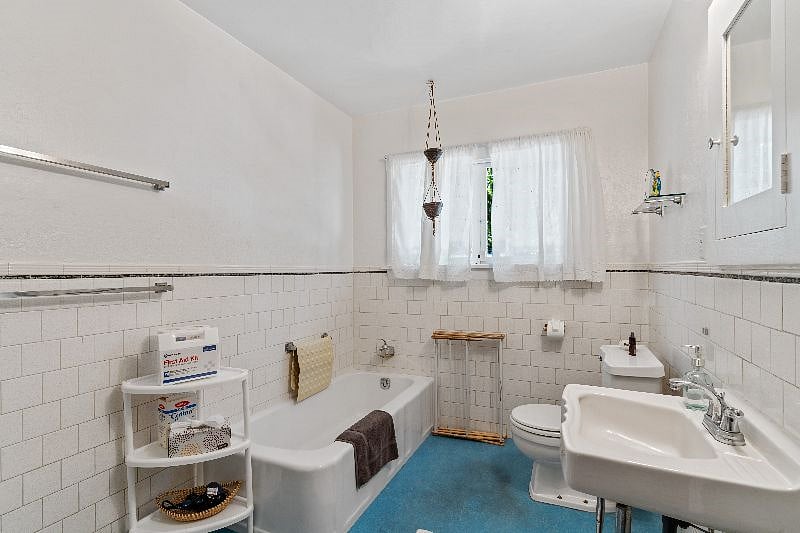 Bathroom with vintage fixtures & walk-in shower
