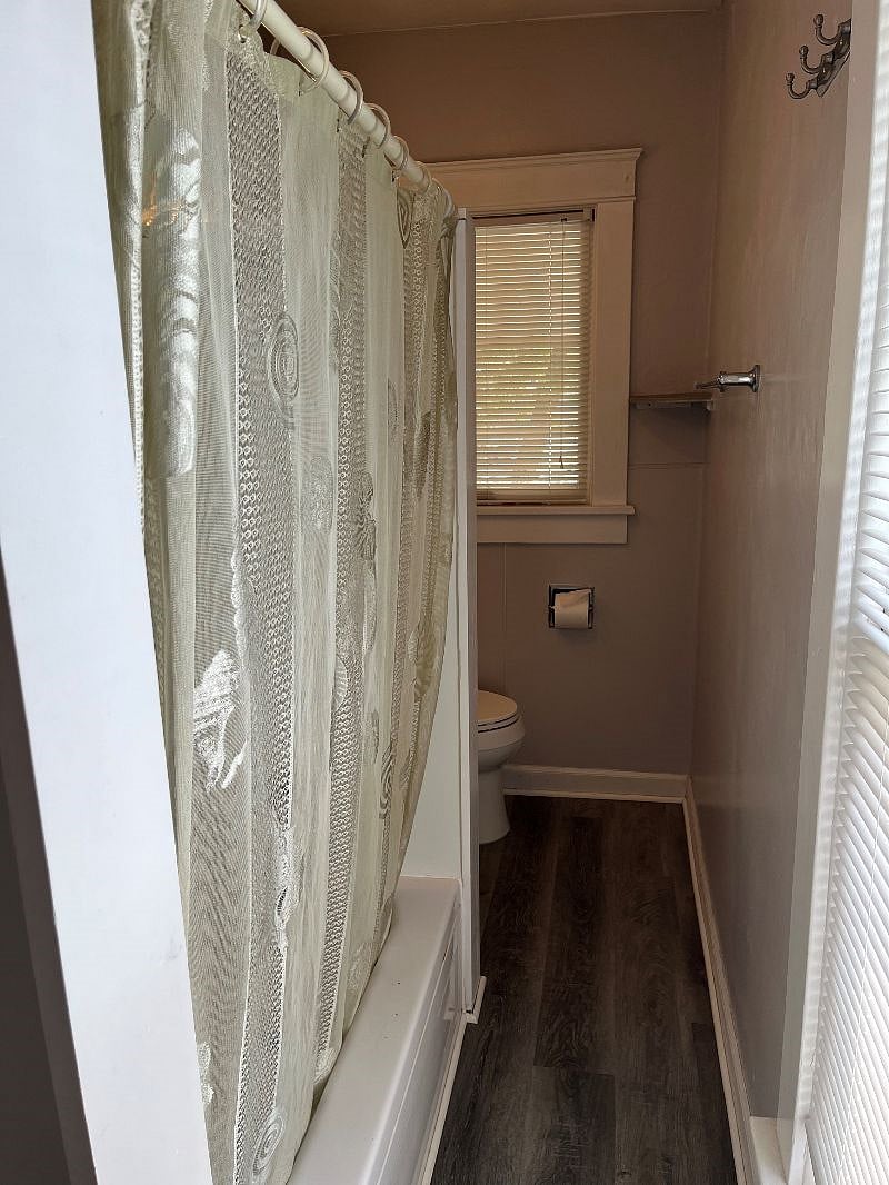 Bathroom with tub/shower.