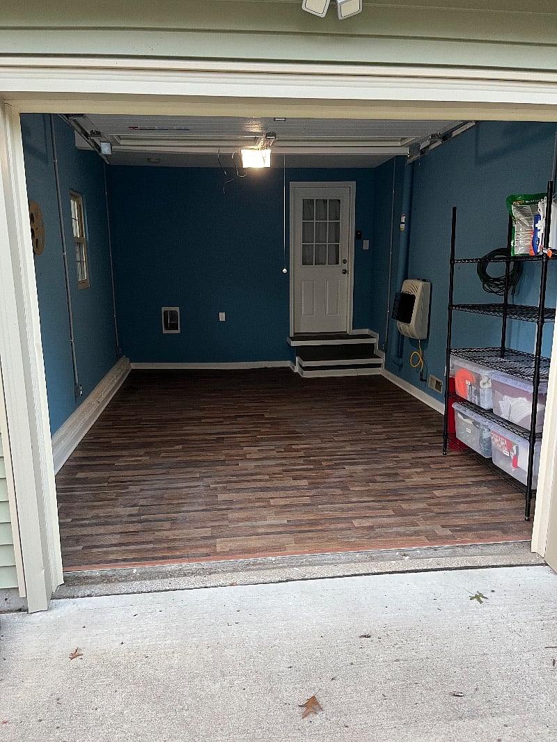 Garage can be used for a car or as a bonus room. It has heat too!