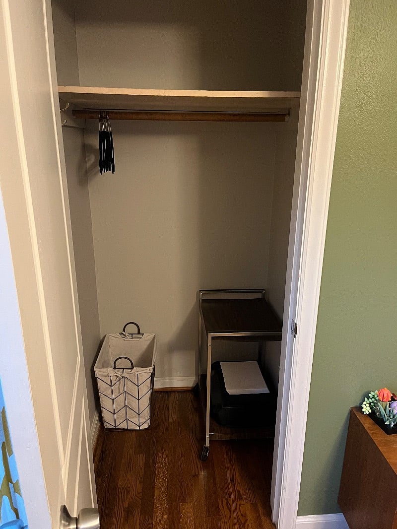 Closet in the spare bedroom. That cart has been removed, leaving you more space for storage.