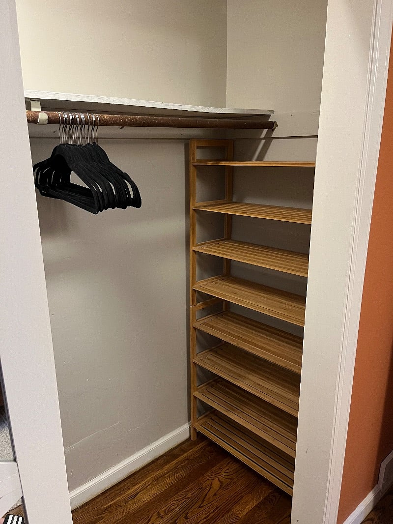 Right side of the closet in the primary bedroom. Lots of room for shoes.
