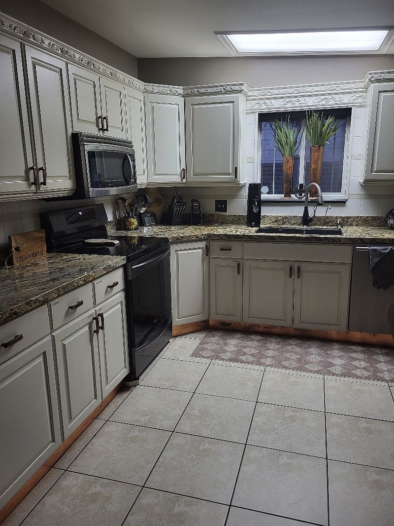 Kitchen with granite countertops