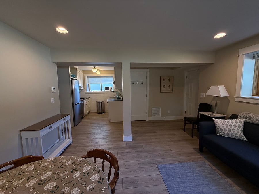 Open living area to kitchen with Light from three sides