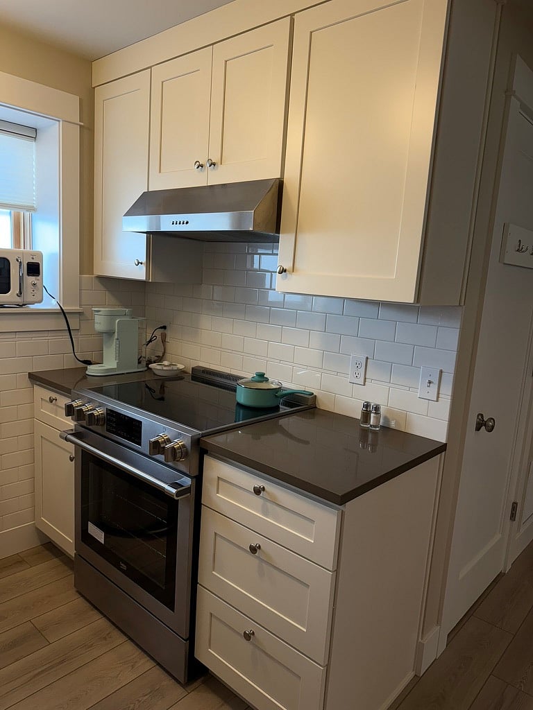 Electric stove and oven with hood fan