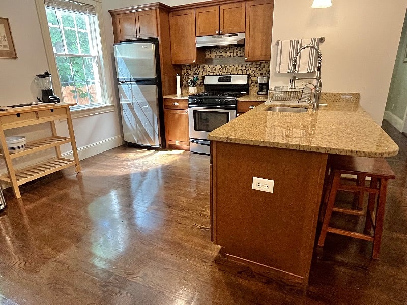 Sunny and bright spot for breakfast or a quick meal. Plenty of storage and counter space.