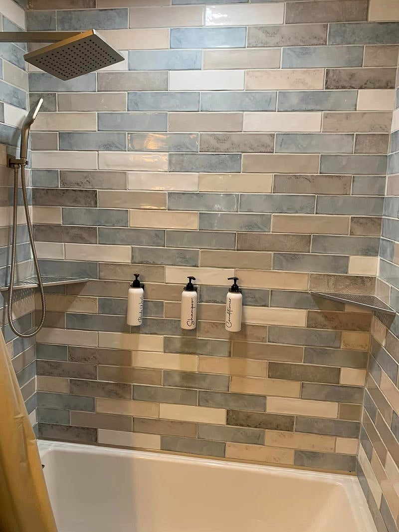 Spa-Like Bathroom
Sunken tub for soaking
Rain shower + updated tile
New vanity & mirror with lots of storage
Fresh linens included