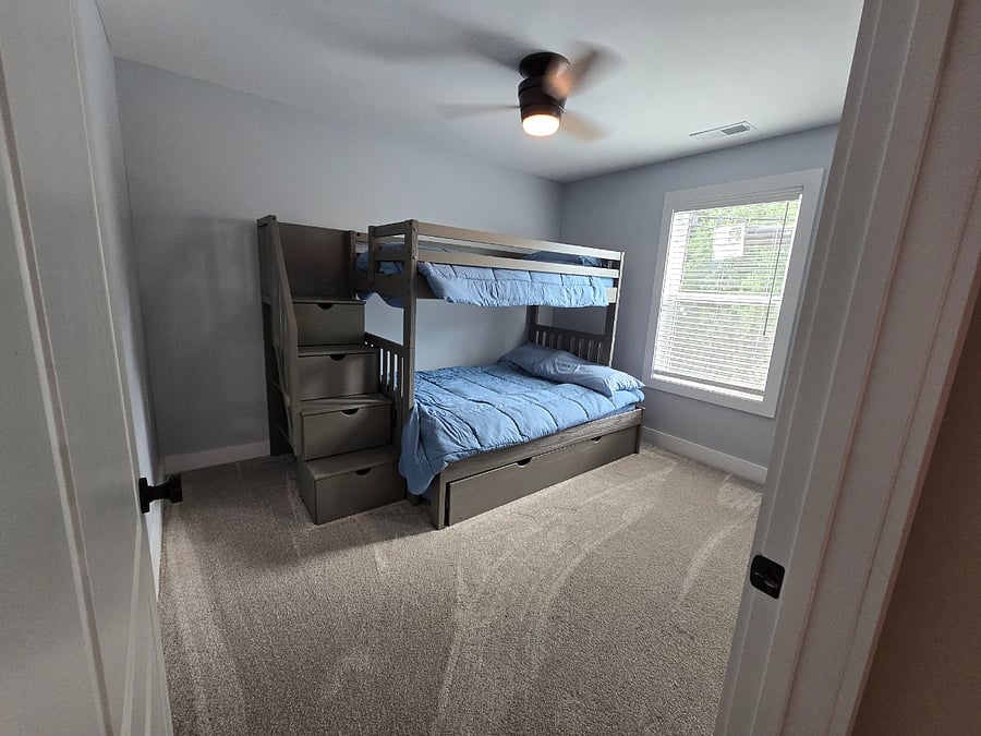 Bunk beds with a bonus trundle underneath that rolls out. Twin, full, twin in that order. 