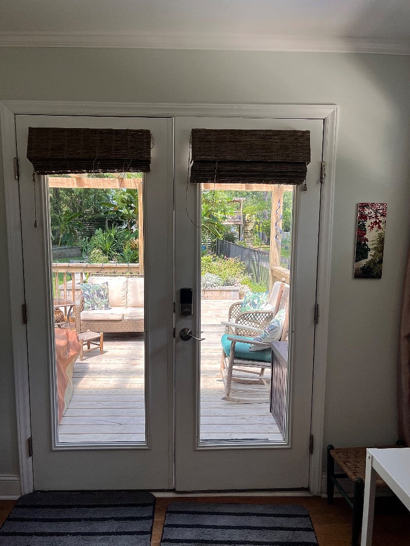 Back door access to the covered deck and fenced backyard