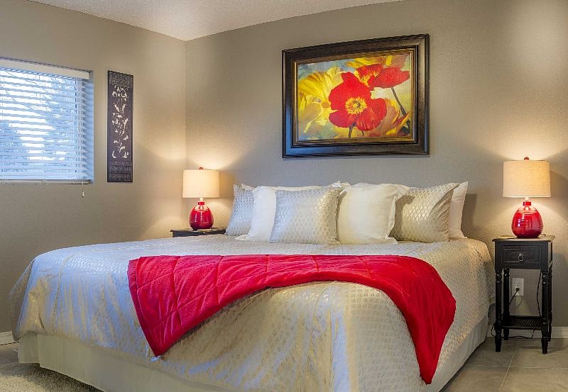 Bedroom with king size bed and TV