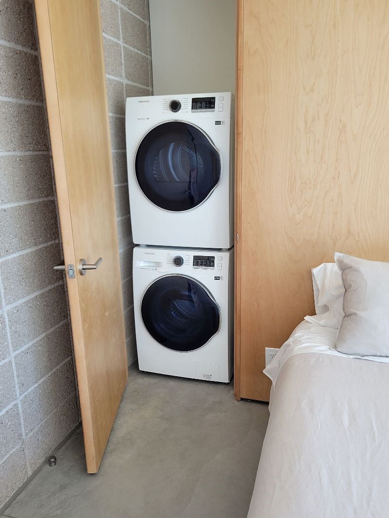stacked washer and dryer closet with true vent
