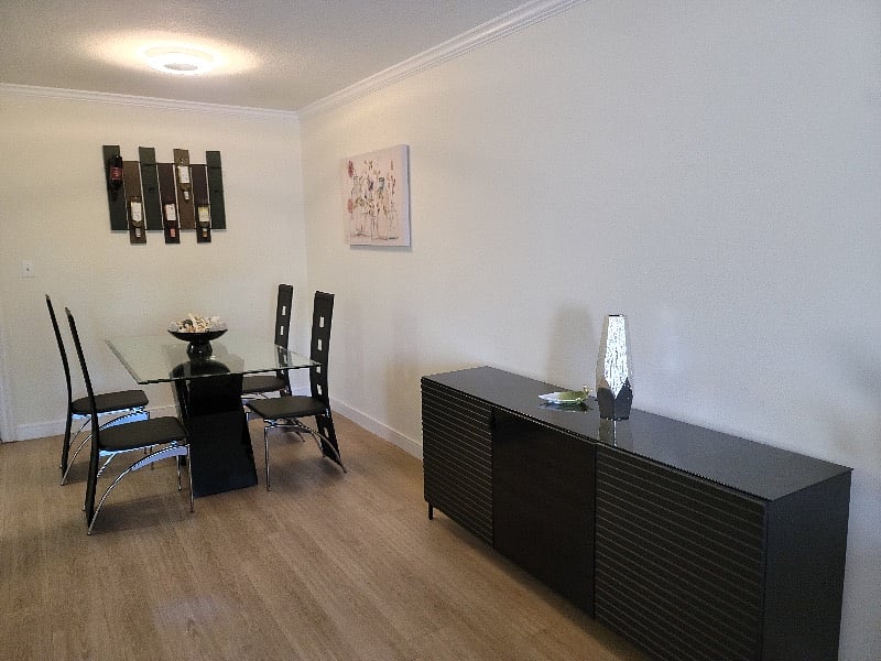 Modern dining table to accommodate up to 4 people. 