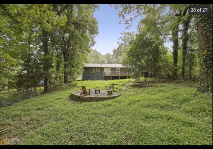 Huge backyard with firepit