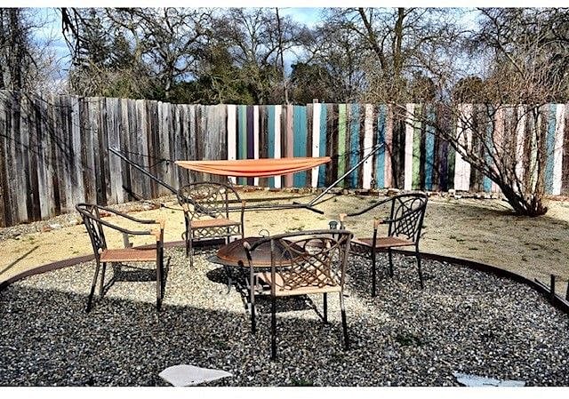 Spacious backyard with firepit