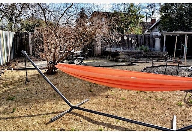 Spacious backyard with hammock