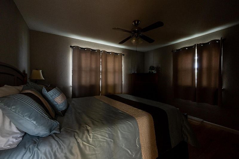 Both bedrooms have room darkening curtains. The room is a bit darker than this photo shows when the bedroom door is closed.