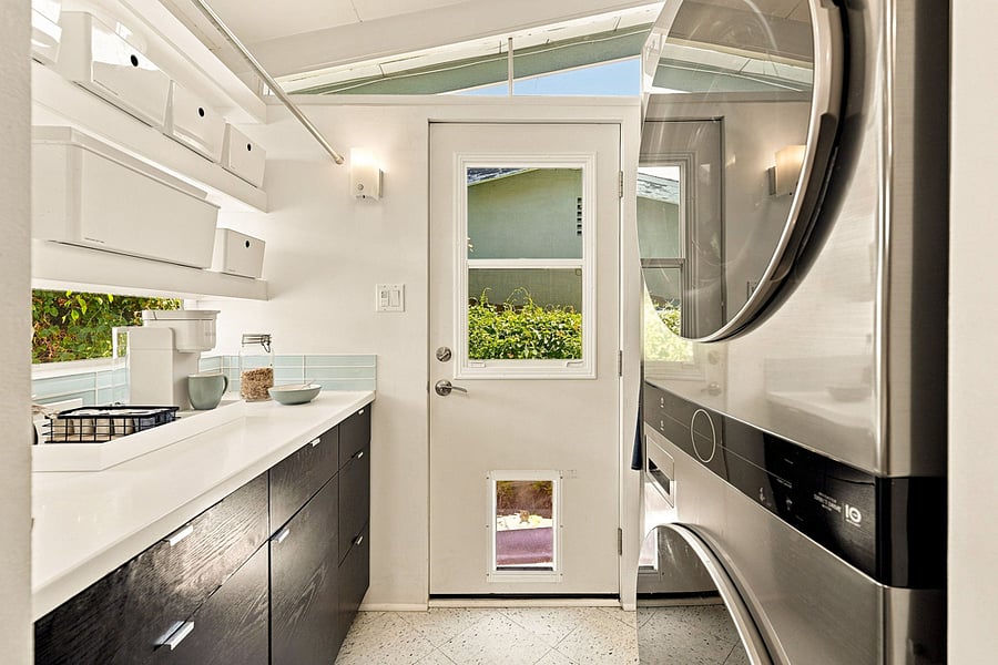 The Laundry area is adjacent to the Kitchen and has a pet door for easy access to the backyard.