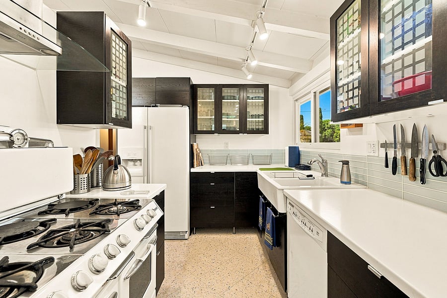 The Kitchen has a dishwasher and full size side-by-side refrigerator/freezer.