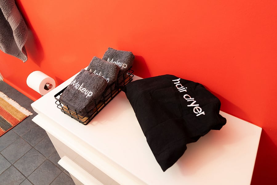 The cabinet provides space for toiletries and the complimentary makeup cloths and hair dryer.