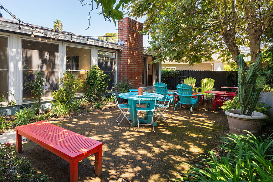 The fenced backyard garden is designed for relaxed entertaining and a safe space for your pet to play. The outdoor dining table will seat 6 people.