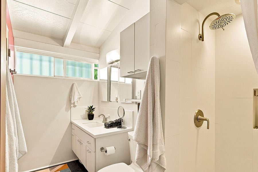 Bathroom 2 has a stall shower.