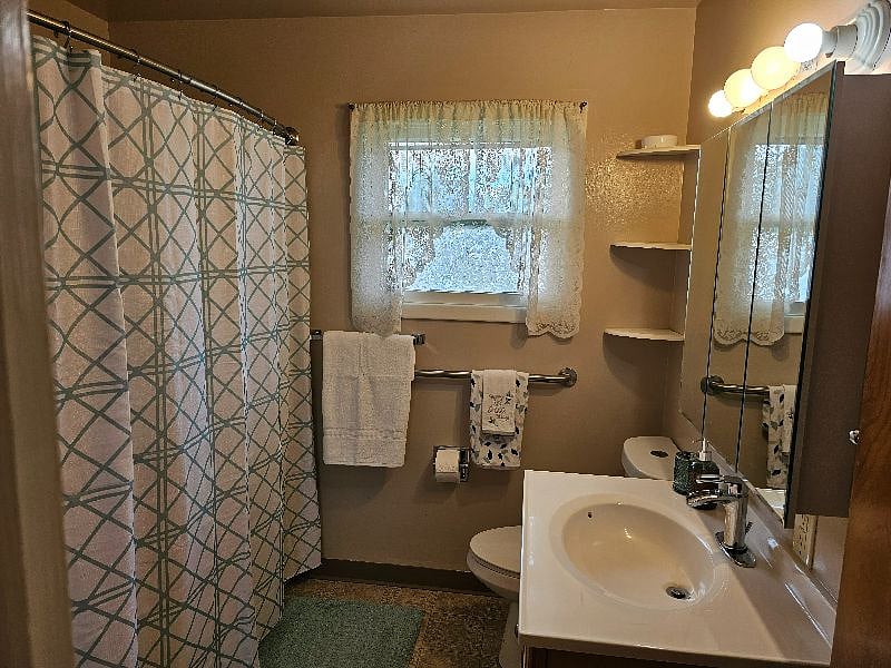 Main bathroom upstairs. There is a second full bathroom downstairs.