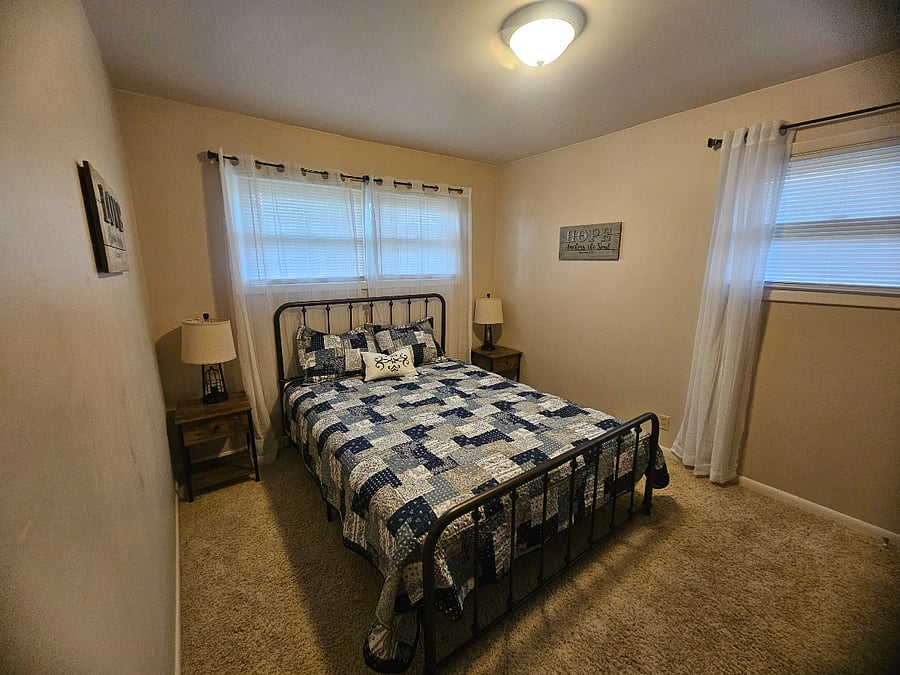 Bedroom 2 - Queen plush mattress, closet space, bureau, smart tv