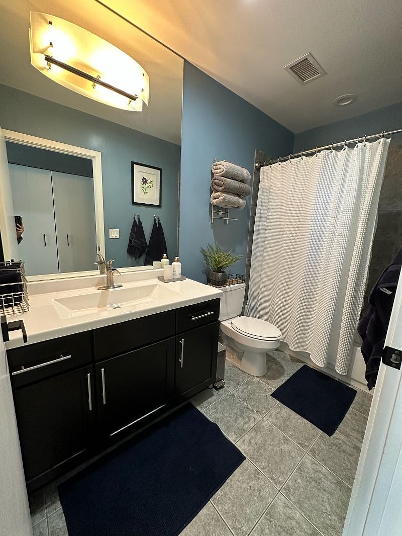 Guest bathroom near second bedroom