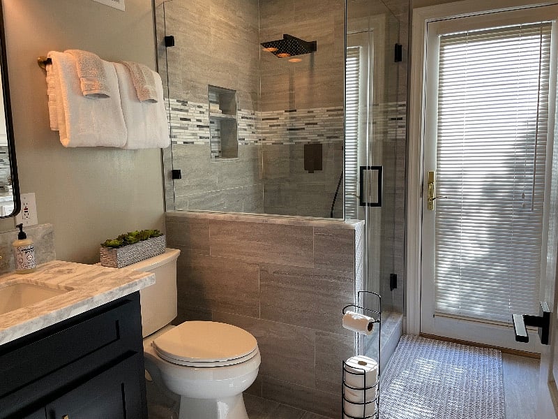 Updated bathroom in 2022 with an overhead shower and a handheld.
