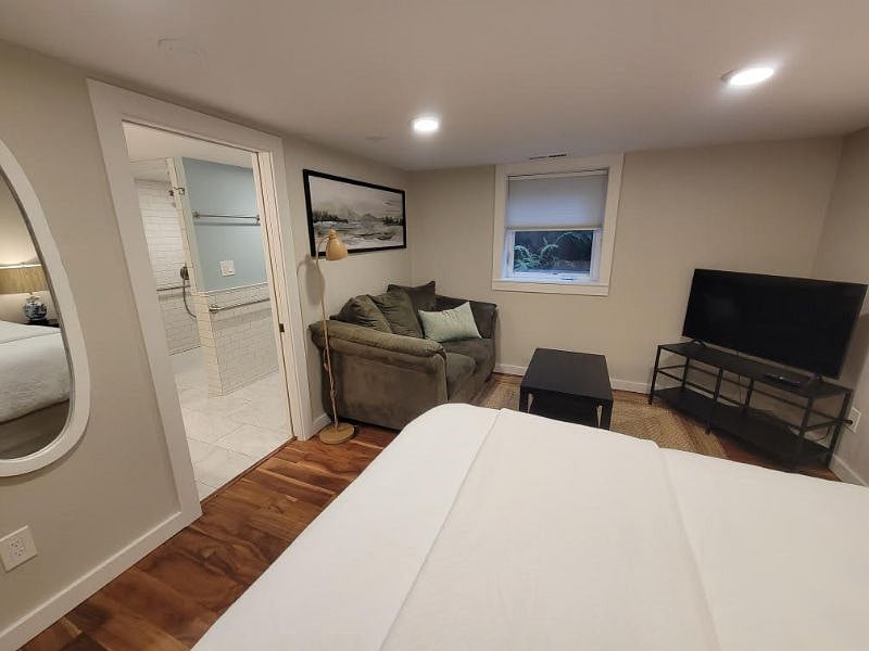 The larger bedroom. For the cleanliness-minded: both beds are fitted with premium mattress protector casings and laundered between tenants.