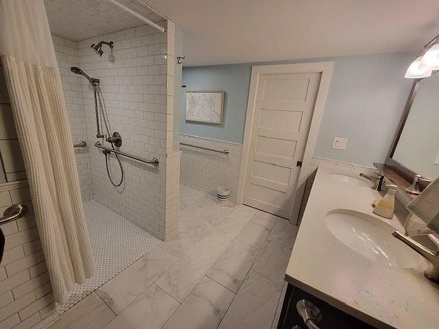 Spacious new bathroom. This unit was built by the previous owners and many of the special touches and conveniences were made for their elderly parents.