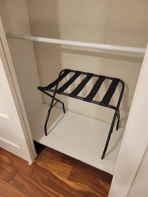 Both bedrooms are stocked with luggage racks.