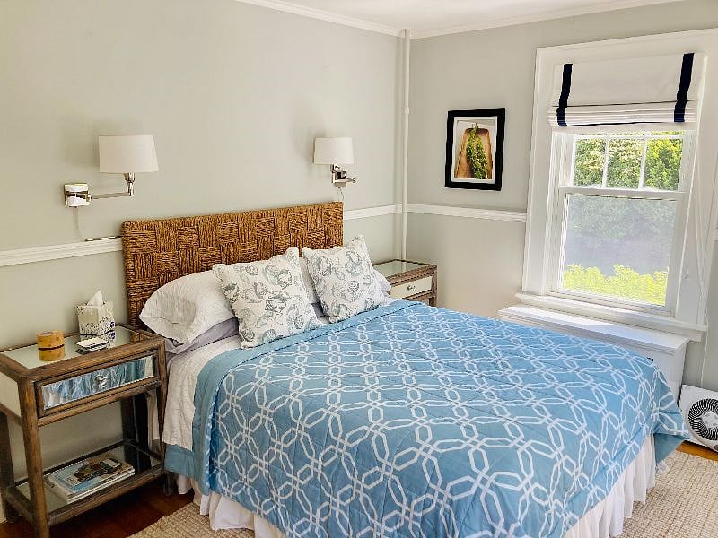 First floor queen bed bedroom with lots of natural light.