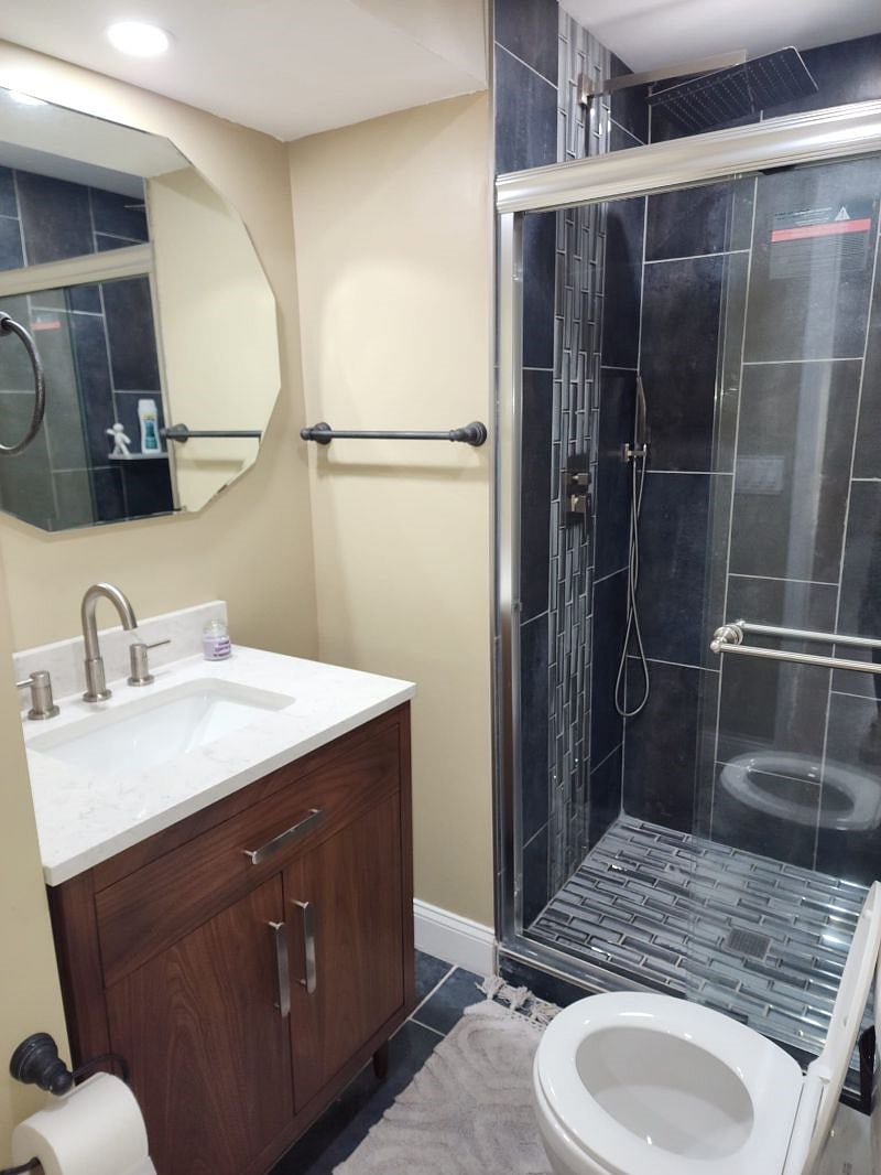 Relax in the master shower with modern fixtures.