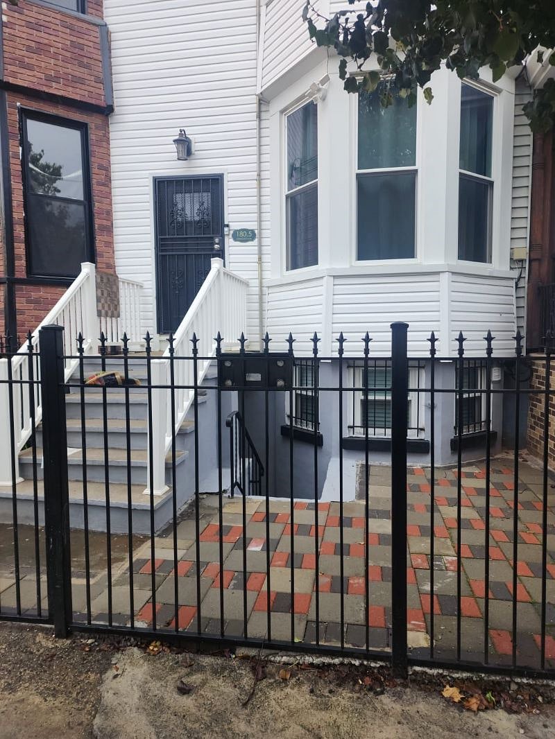 Fully fenced front yard for added privacy.