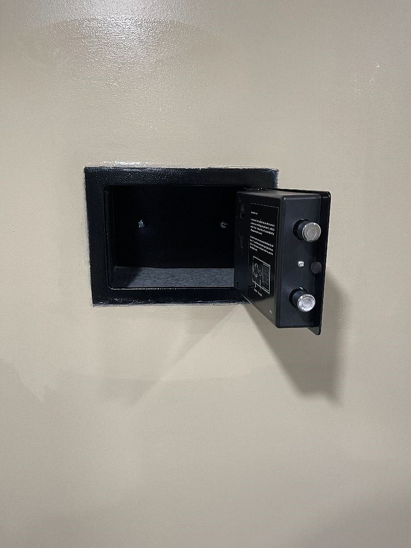 Secure your valuables with the provided safe deposit box.