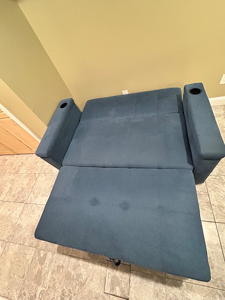 Convert the sofa into a bed for extra sleeping space.