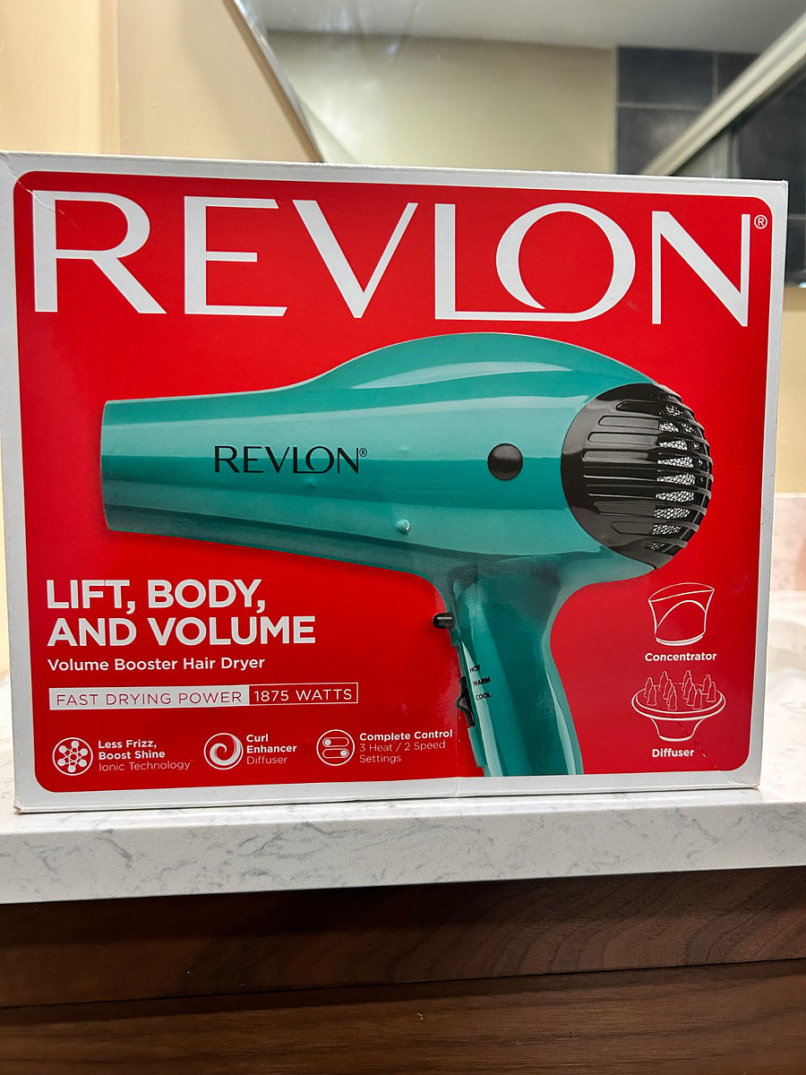A blow dryer is provided for your convenience.