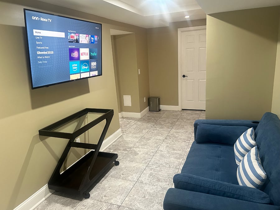 Enjoy a comfortable living room with a table and seating area.
