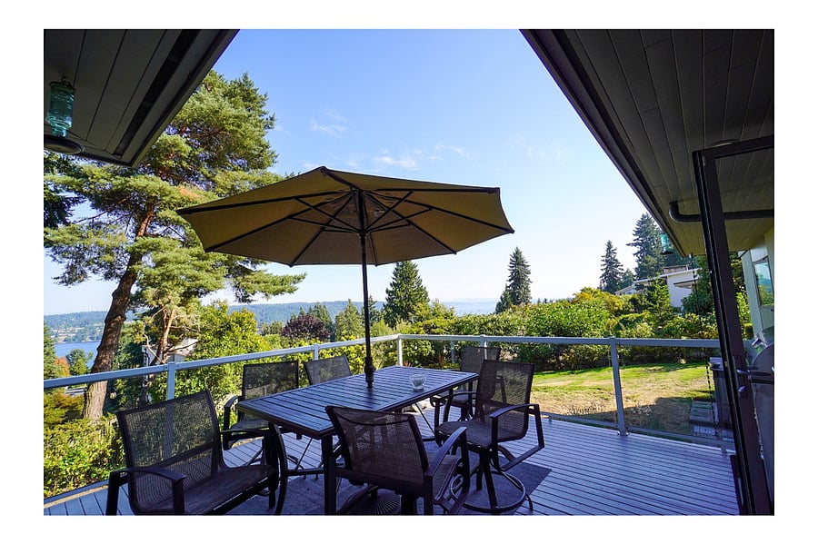 Outdoor seating area with lake views