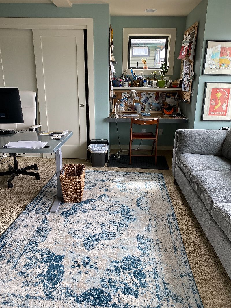 Den/Office with large screen TV and adjustable height desk