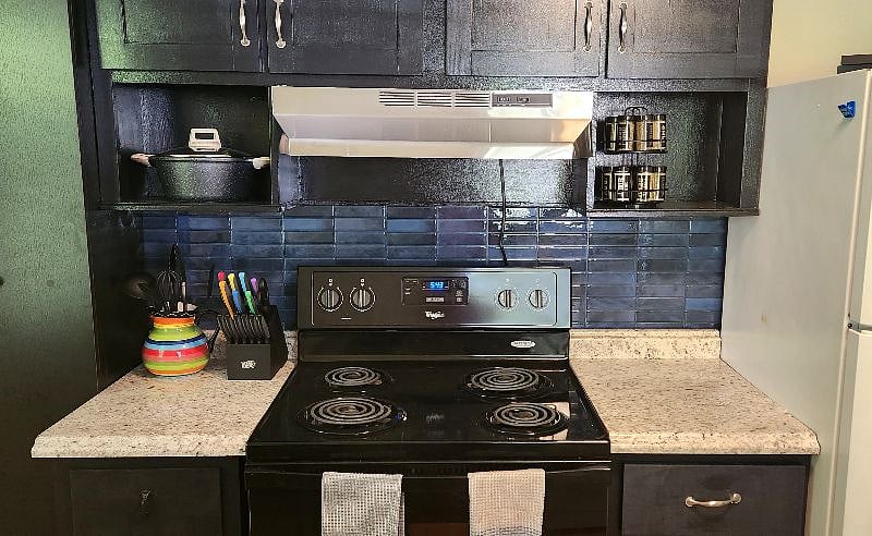 Fully equipped kitchen with full-size appliances, cookware, and everything you need to cook at home.