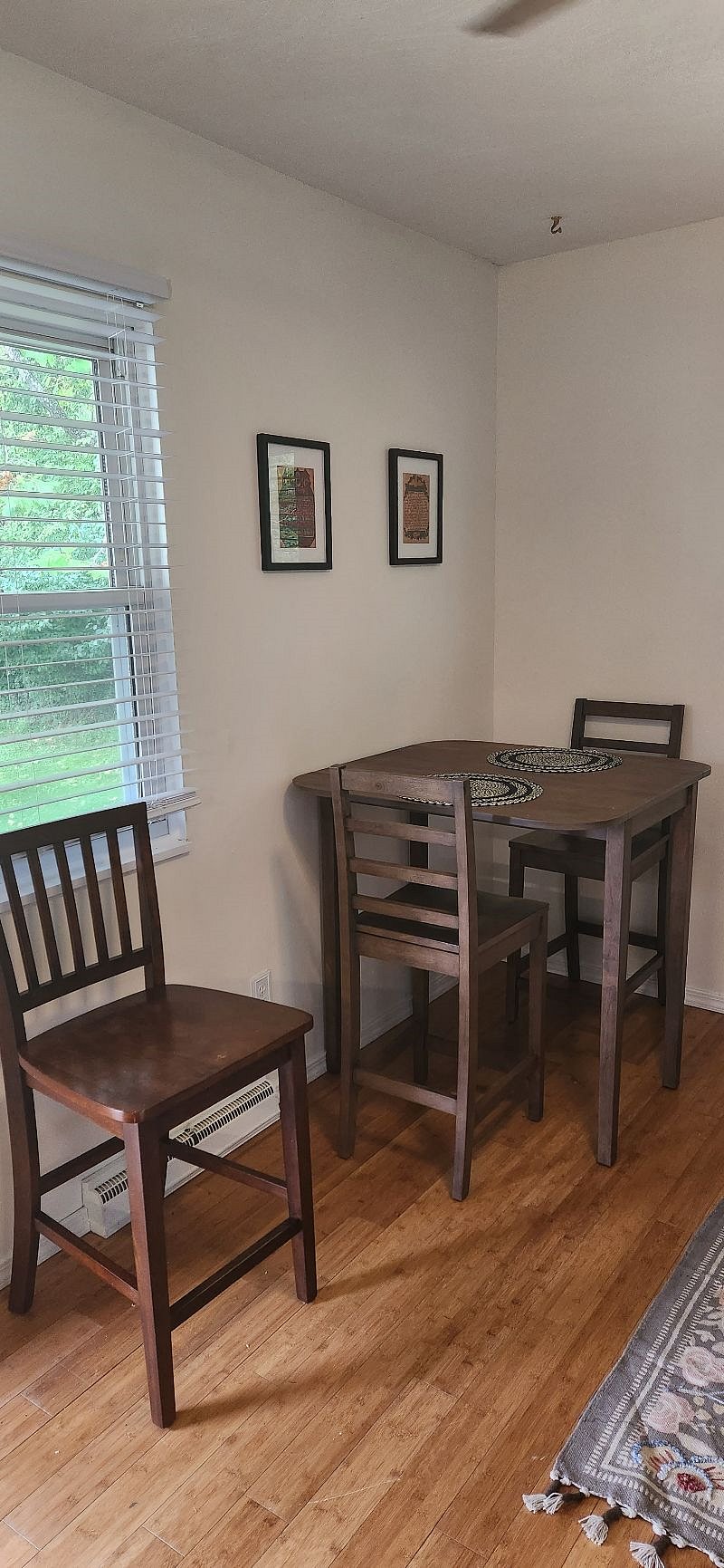 Bright dining space perfect for meals, work, or study.