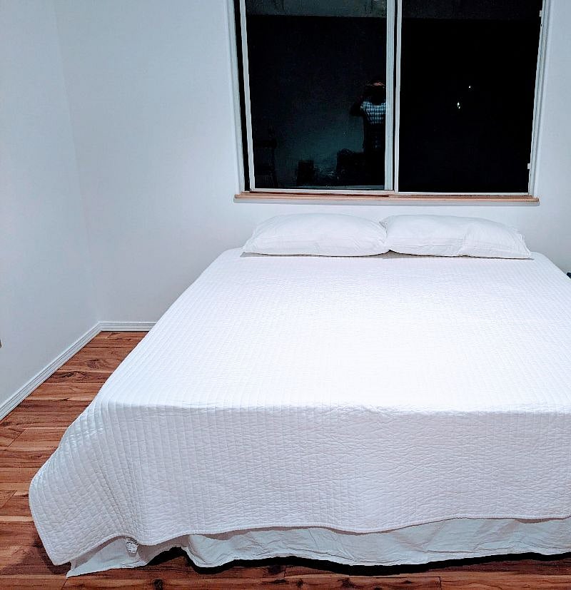 king size bed in primary bedroom