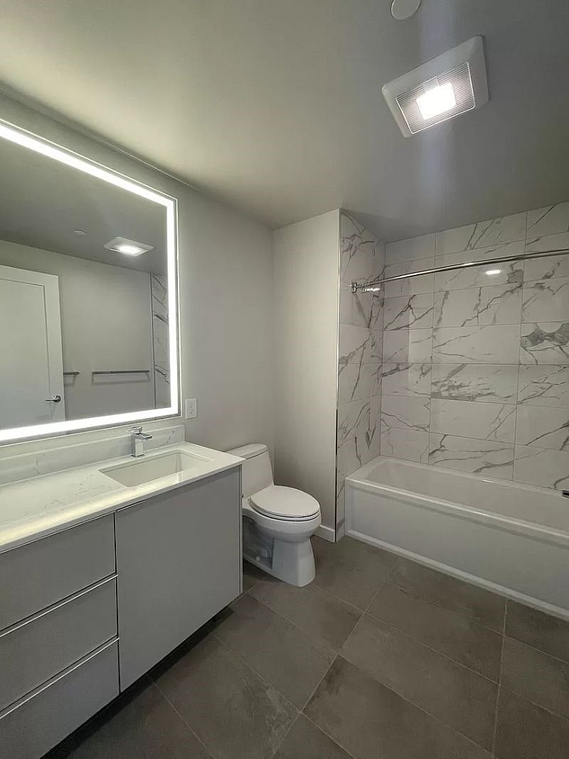 large sleek and modern bathroom